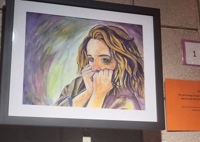 Drawing of a woman with curly hair partially covering her face